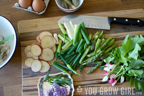 eggs in bed of garden veggies